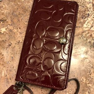 Coach burgundy patent leather wristlet